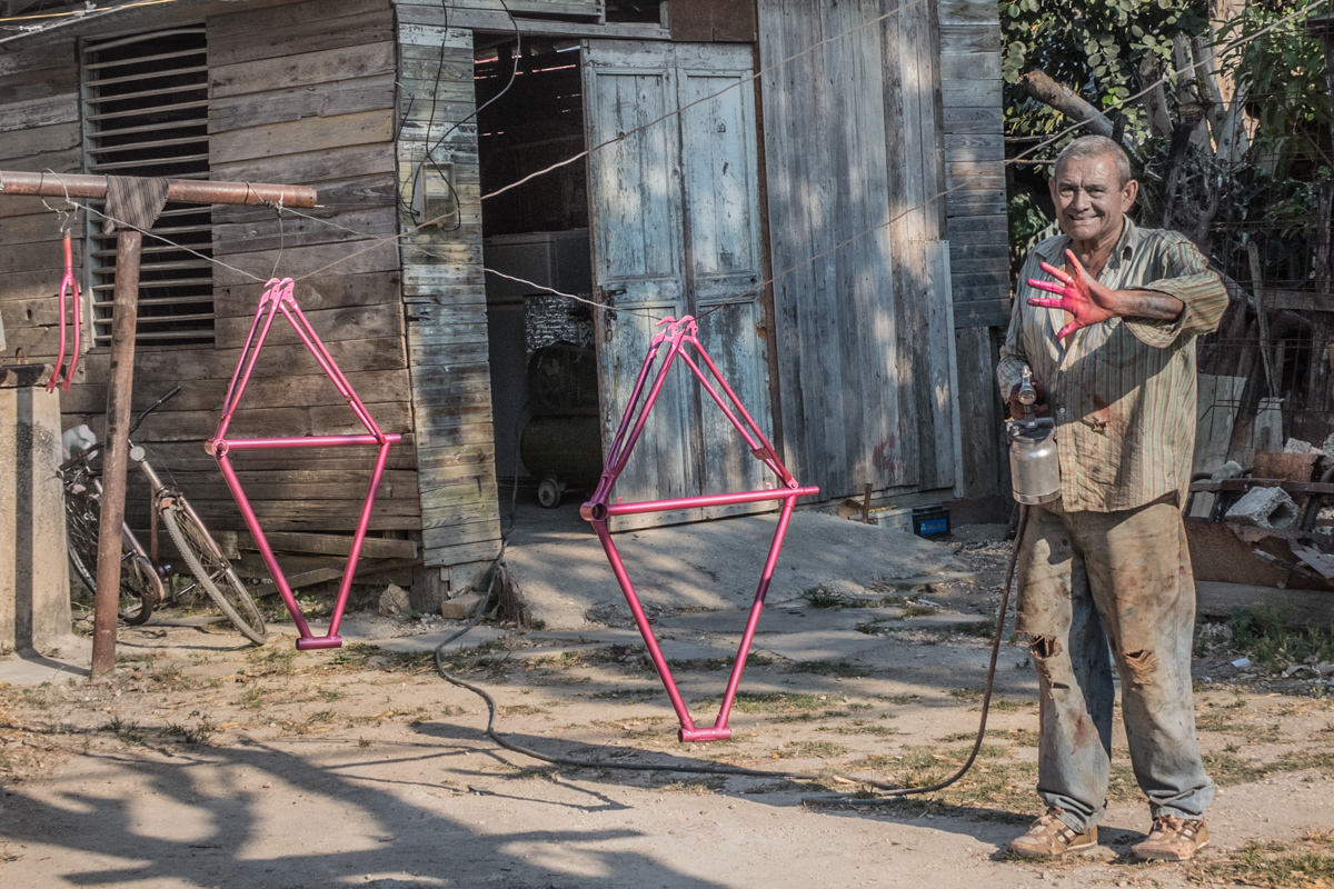 We found this guy painting bike frames in his front yard